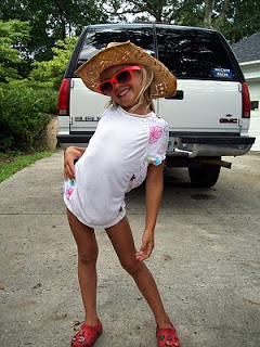 amy2 Gilr wearing hat and sunglasses
