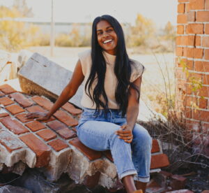 headshot of Ramya Gruneisen laughing and smiling